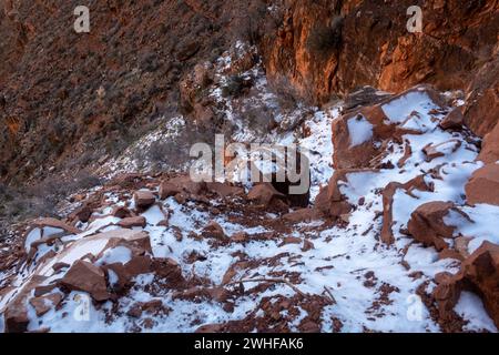 Snow Covered Rock Fall Along Boucher Trail in the Grand Canyon Stock Photo