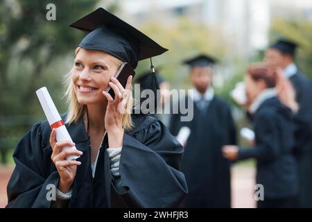 Phone call, student or happy woman in graduation on campus in university, school or college. Outdoor, education scholarship or excited graduate with Stock Photo