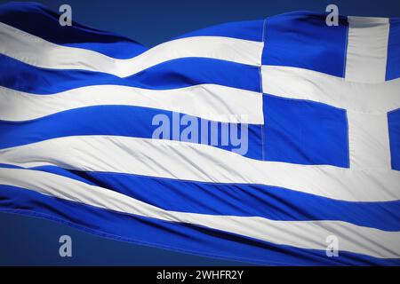 National flag of Greece against blue sky background Stock Photo