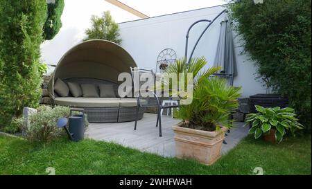 Garden terrace with lounge and seating area Stock Photo