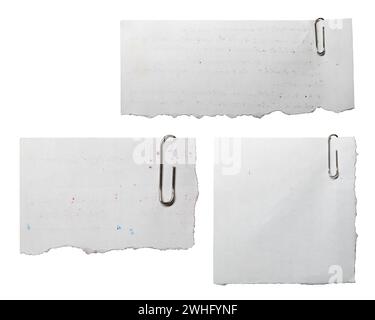 Reused note memo paper with paper clips on white background with clipping path Stock Photo