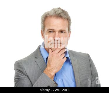 Business, studio and mature man thinking, planning or solution for financial decision, investment or choice. Corporate CEO or boss in suit with ideas Stock Photo
