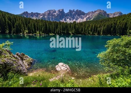 Karersee lake in the Dolomites, South Tyrol, Italy, also known as lake Carezza Stock Photo