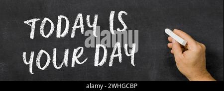 Text written on a blackboard -  Today is your day Stock Photo