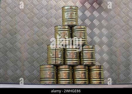 Stacked tin cans for a throwing game at a carnival funfair or Christmas market, copy space Stock Photo