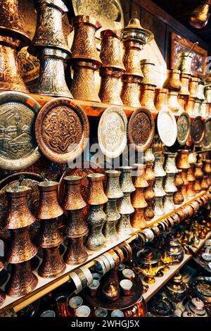 Many golden copper pots or kettles, used for making Turkish coffee. Stock Photo