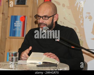 Author Marco Buelow reading from the book Lobbyland on 02/02/2023 in the Magdeburg City Library Stock Photo