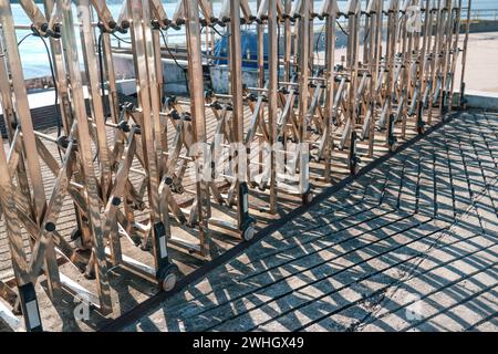 Folding old blue metal door gate Stock Photo