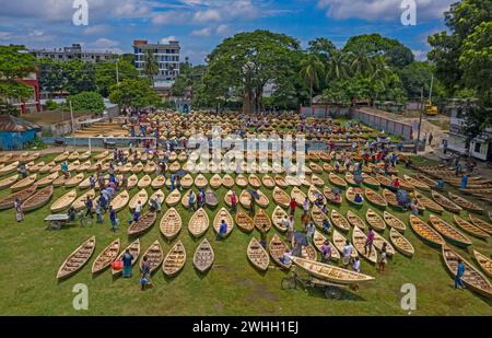 Aerial view of hundreds of small wooden boats are lined up for sale at the largest traditional boat market in Manikganj, Bangladesh. Stock Photo