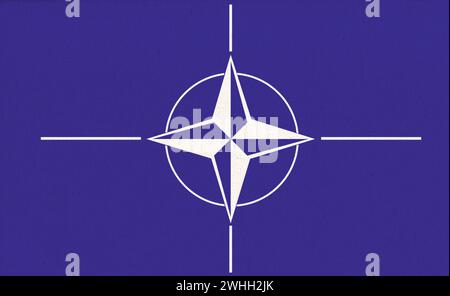 NATO North Atlantic Treaty Organization flag. NATO is international military alliance that constitut Stock Photo