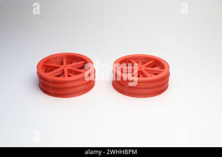 Set of wheels for hobby electronic projects printed with pla filament and using 3d printer isolated on white background Stock Photo