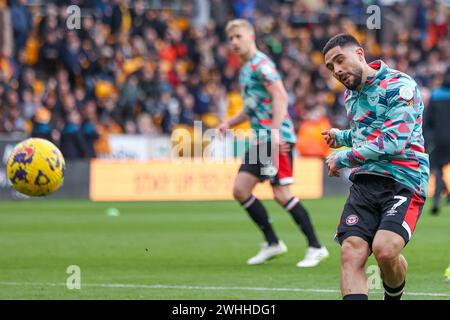 Wolverhampton, UK. 10th Feb, 2024. Brentford's Neal Maupay warms up ahead of the Premier League match between Wolverhampton Wanderers and Brentford at Molineux, Wolverhampton, England on 10 February 2024. Photo by Stuart Leggett. Editorial use only, license required for commercial use. No use in betting, games or a single club/league/player publications. Credit: UK Sports Pics Ltd/Alamy Live News Stock Photo