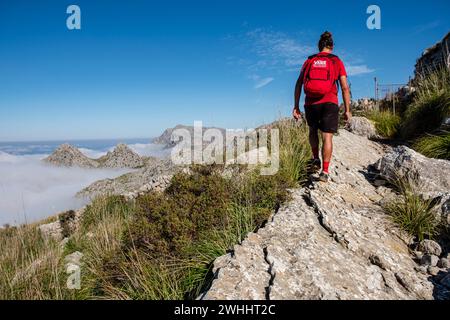 Hiker on the way to Es Binis Stock Photo