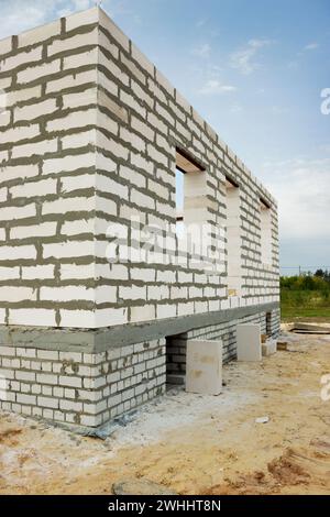 Construction of house from foam concrete blocks on bought site. First stage Stock Photo