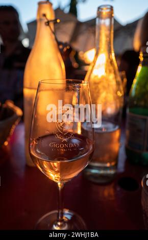 Wine glasses in the evening sun at a brasserie in Gigondas, Côtes du Rhône, Provence, France Stock Photo