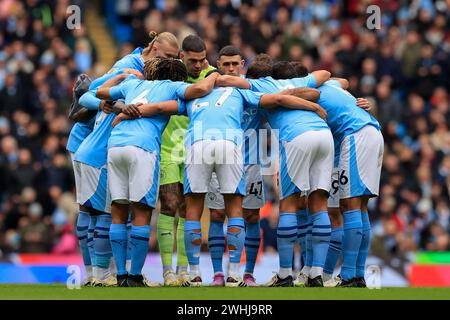 City team huddle ahead of the Premier League match Manchester City vs