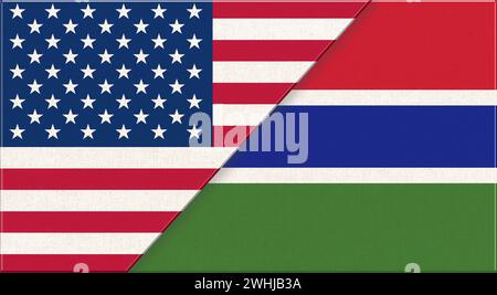 Flags of USA and Gambia. American and Gambian national flags on fabric surface. Flag of USA and Gamb Stock Photo