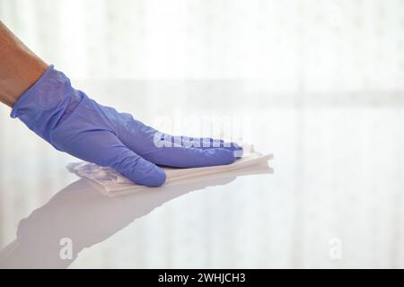 Surface disinfecting home cleaning with sanitizing antibacterial wipes protection against COVID-19 Stock Photo