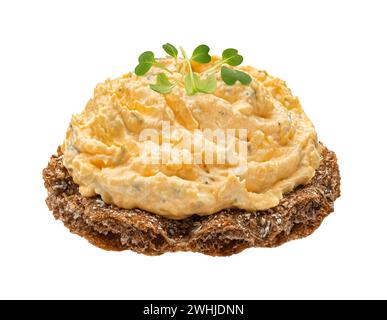 Egg spread with onion and chives on rye crispbread isolated on white background Stock Photo