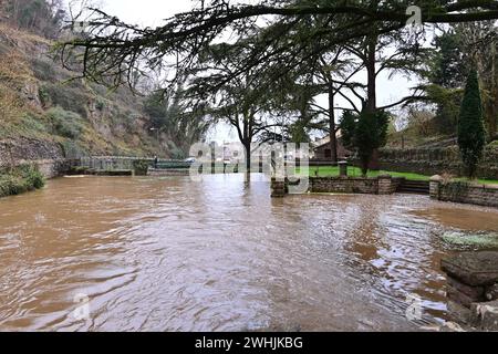 On a damp and wet afternoon World Famous Cheddar Goughs Cave is Closed to the Public Temporarily due to flooding by the River Yeo which flows under ground and out through into the rest of the village and controlled by flood gates. Picture Credit Robert Timoney/AlamyLiveNews Stock Photo