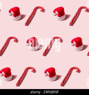 Trendy Christmas seamless texture with Santa Claus hat and candy cane. Modern christmas design Stock Photo