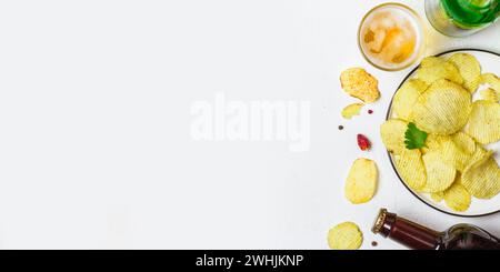 Beer and potato chips on a white background Stock Photo