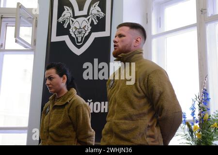 Kyiv, Ukraine. 10th Feb, 2024. Serhiy Filimonov (call sign Filya) (R), and Alina Mykhaylova (L) are officers of the Armed Forces of Ukraine signed to the 'Da Vinci Wolves' battalion are seen during the opening of the recruiting center for the recruitment of volunteers. Fighters of the 'Da Vinci Wolves' battalion announced the opening of a recruiting center for the recruitment of fighters to resist Russia's military aggression in Kyiv. (Photo by Aleksandr Gusev/SOPA Images/Sipa USA) Credit: Sipa USA/Alamy Live News Stock Photo