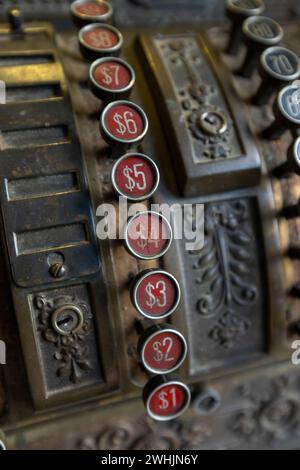 Old Cash Register in close up shot. Antique style cashier register with numbers and details Stock Photo