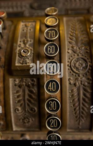 Old Cash Register in close up shot. Antique style cashier register with numbers and details Stock Photo