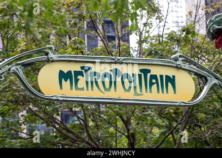 Ornate Art Nouveau French metro gate relocated at the St-Antoine entrance of the Square Victoria station in the international district. Montreal, Queb Stock Photo