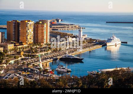 View over Malaga at sunset travel banner Stock Photo