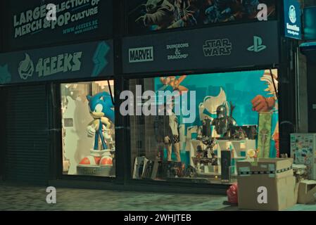 Brussels, Belgium. 5-02-2024. Abstract landscape of the city of Brussels at night. Sonic character from games in a display case under glass Stock Photo