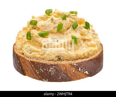 Egg spread with onion and chives on rye bread isolated on white background Stock Photo