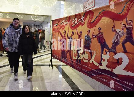 Fuyang, China. 10th Feb, 2024. Visitors are passing by movie posters at a cinema in Fuyang, China, on February 10, 2024. (Photo by Costfoto/NurPhoto) Credit: NurPhoto SRL/Alamy Live News Stock Photo