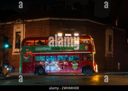 Experience London's Gringmas Afternoon Tea Bus Tour on Christmas Night. Stock Photo