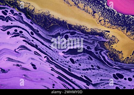 Metallic gold abstraction on violet waves. Fluid Art. Marble effect background or texture Stock Photo