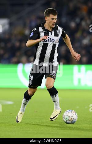 ALMELO - Ajdin Hrustic of Heracles Almelo during the Dutch Eredivisie match between Heracles Almelo and Vitesse at the Erve Asito stadium on February 10, 2024 in Almelo, Netherlands. ANP COR LASKER Stock Photo