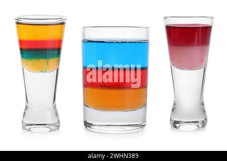 Different shooters in shot glasses isolated on white, set Stock Photo