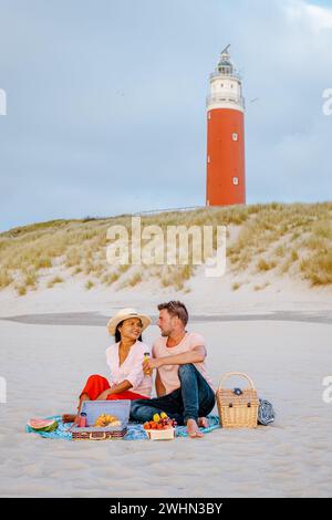Picnic on the beach Texel Netherlands, couple having picnic on the beach of Texel Stock Photo