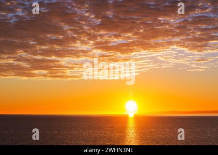 Picturesque sunset on the beach Stock Photo