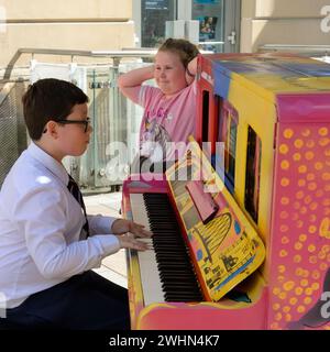4th, August, 2018. 'Kibble' on Hutcheson St, Merchant City, Glasgow, Scotland. One of the many free to play pianos dotted round the city during the Gl Stock Photo