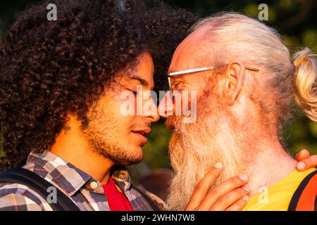 Love Knows No Bounds: Joyful Gay Couple Embracing in Nature Stock Photo