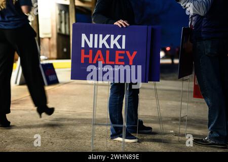 Gilbert, South Carolina - February 10, 2024: Nikki Haley supporters hold signs during her 'Beast of The Southeast' campaign bus tour. Stock Photo