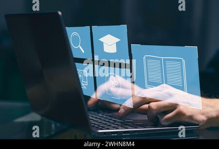E-learning and Online Education concept. Male student learning lesson process holding hands on laptop keyboard. Web internet tec Stock Photo