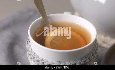 Cup of hot tea with lemon Stock Photo