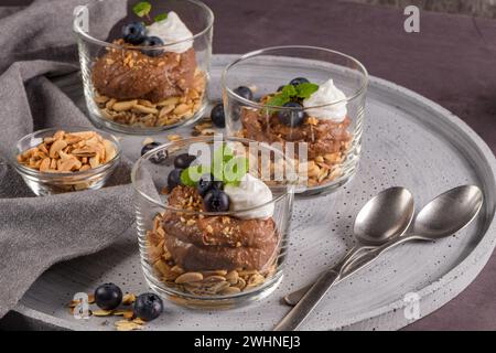 Glass cups of chocolate and chestnuts mousse Stock Photo