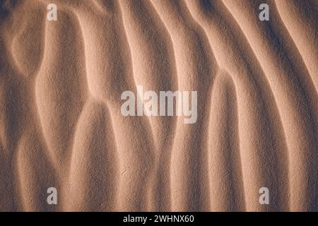 Sand texture formed by wind at the beach Stock Photo
