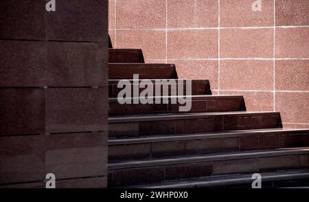 Steps of an empty stone granite staircase close up Stock Photo