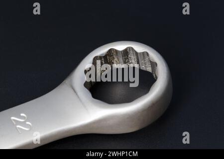 22mm ring spanner head close up on dark background Stock Photo