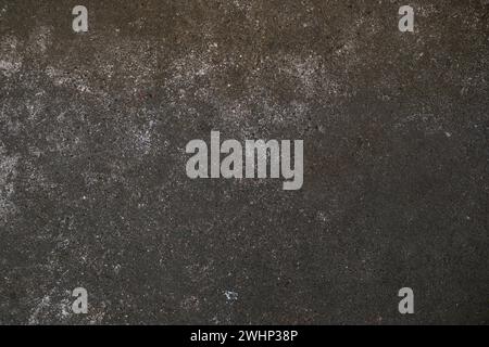 Dark gray concrete surface as grunge background texture for urban themes like subculture, underground or even architecture, full Stock Photo